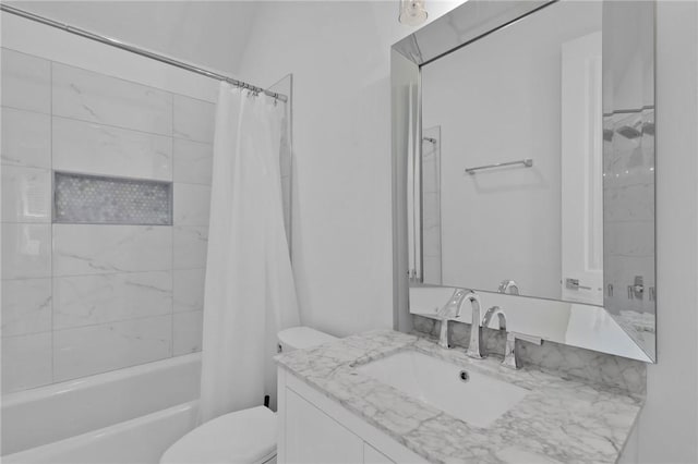 full bathroom with shower / bathtub combination with curtain, vanity, and toilet