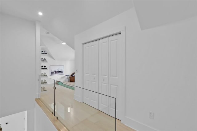 corridor featuring hardwood / wood-style flooring