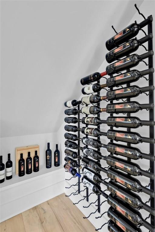 wine cellar featuring hardwood / wood-style floors