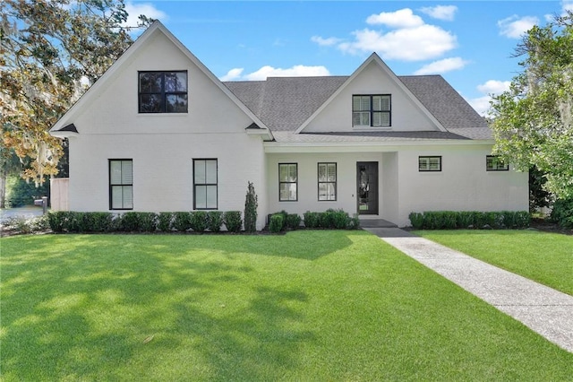 view of front of home featuring a front yard