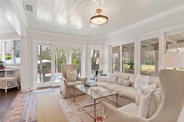 sunroom featuring wood ceiling and visible vents