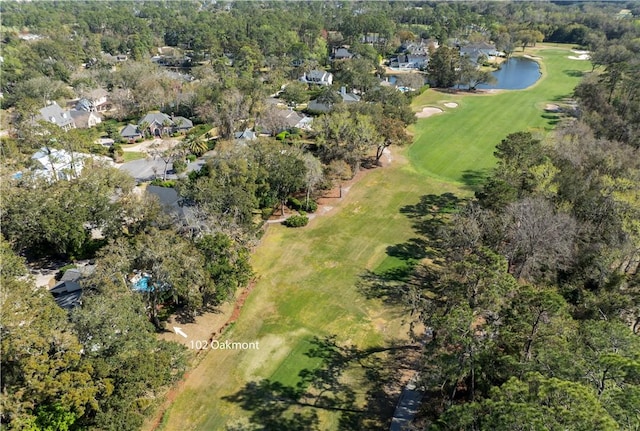 bird's eye view with golf course view and a water view