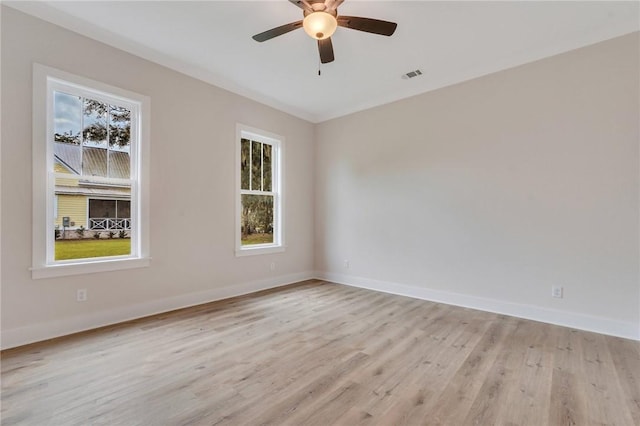 unfurnished room with ceiling fan and light hardwood / wood-style flooring