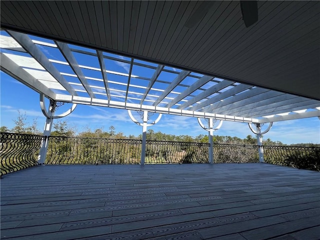 wooden deck featuring a pergola