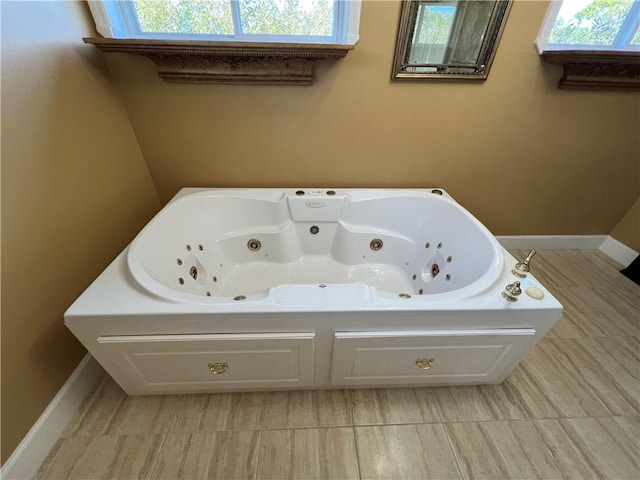 bathroom featuring a bath