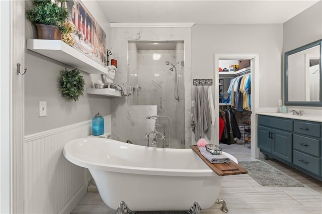 bathroom featuring vanity and plus walk in shower