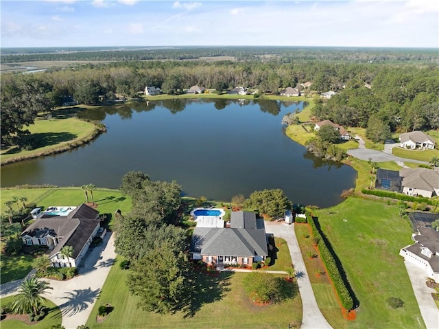 drone / aerial view with a water view