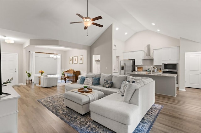 116 Heatherly Way, Brunswick, GA 31523 - living room with high vaulted ceiling, a chandelier, ceiling fan, light wood-style floors, and recessed lighting