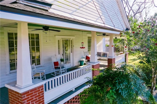 property entrance featuring covered porch and ceiling fan