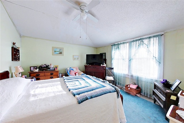 carpeted bedroom featuring ceiling fan, vaulted ceiling, and a textured ceiling