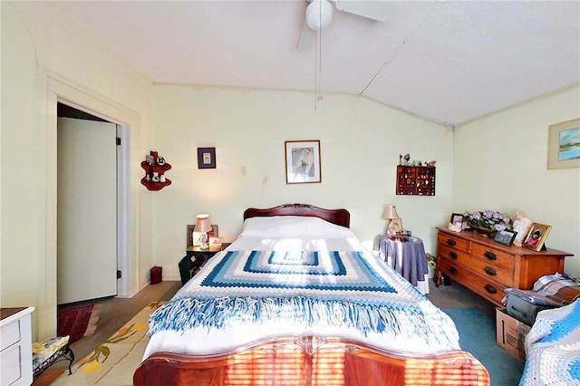 bedroom with ceiling fan and vaulted ceiling