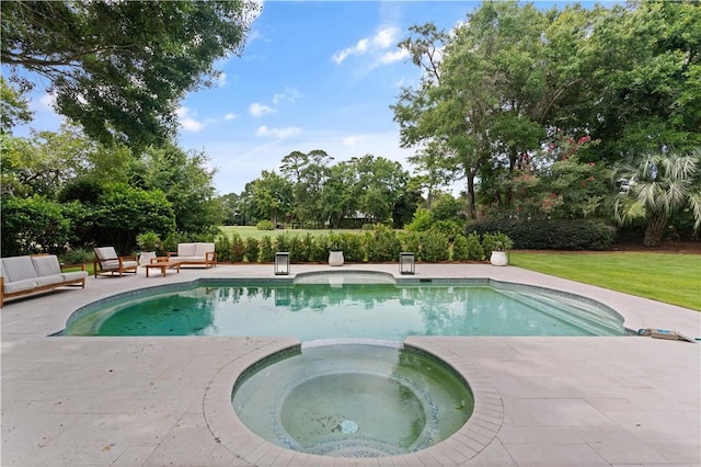 view of swimming pool with a patio area and an in ground hot tub