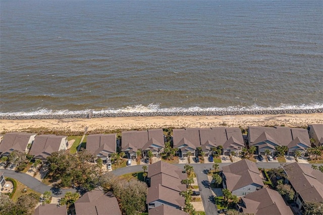 aerial view with a beach view and a water view