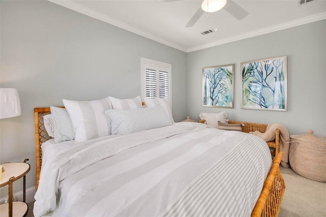 bedroom featuring ceiling fan, carpet, and ornamental molding