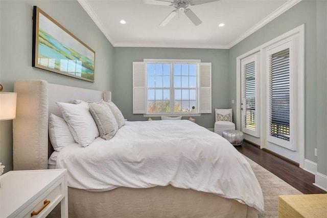 bedroom featuring ceiling fan, dark wood-type flooring, access to outside, and multiple windows