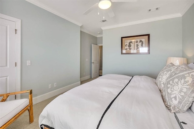 carpeted bedroom with ceiling fan and crown molding