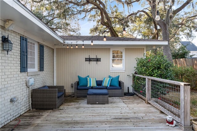 wooden deck featuring outdoor lounge area