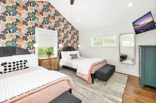 10 Fern Ln, Saint Simons Island, GA 31522 - bedroom with lofted ceiling, wood finished floors, recessed lighting, and ceiling fan