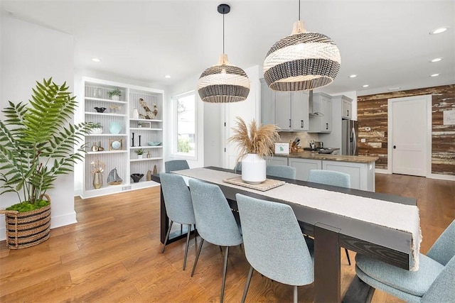 10 Fern Ln, Saint Simons Island, GA 31522 - dining space with dark wood finished floors and recessed lighting