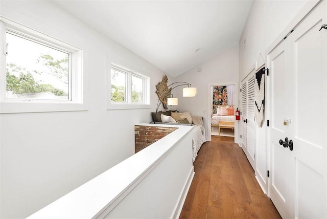 10 Fern Ln, Saint Simons Island, GA 31522 - hall featuring vaulted ceiling and wood finished floors