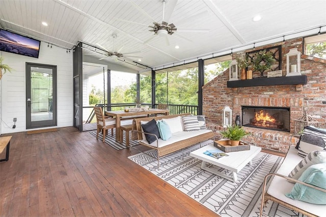 10 Fern Ln, Saint Simons Island, GA 31522 - sunroom / solarium with ceiling fan, healthy amount of natural light, and outdoor dining space