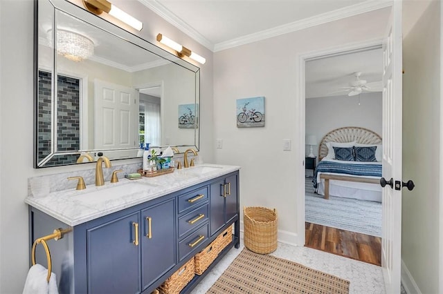 19 Wimbledon Ct, Saint Simons Island, GA 31522 - ensuite bathroom featuring double vanity, crown molding, and ceiling fan