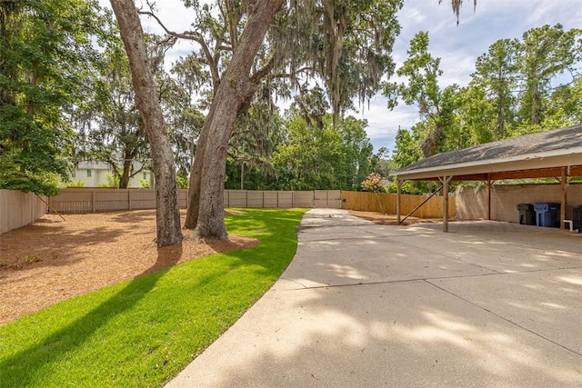 19 Wimbledon Ct, Saint Simons Island, GA 31522 - fenced backyard featuring a patio