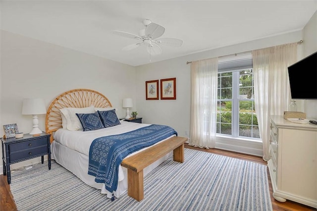 19 Wimbledon Ct, Saint Simons Island, GA 31522 - bedroom with wood finished floors and a ceiling fan