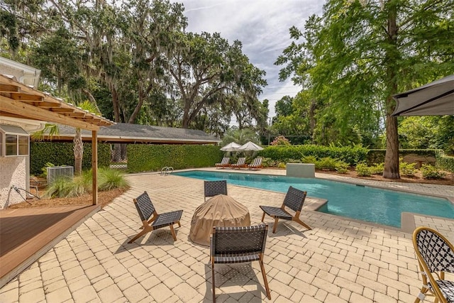 19 Wimbledon Ct, Saint Simons Island, GA 31522 - view of pool with a patio area and view of wooded area