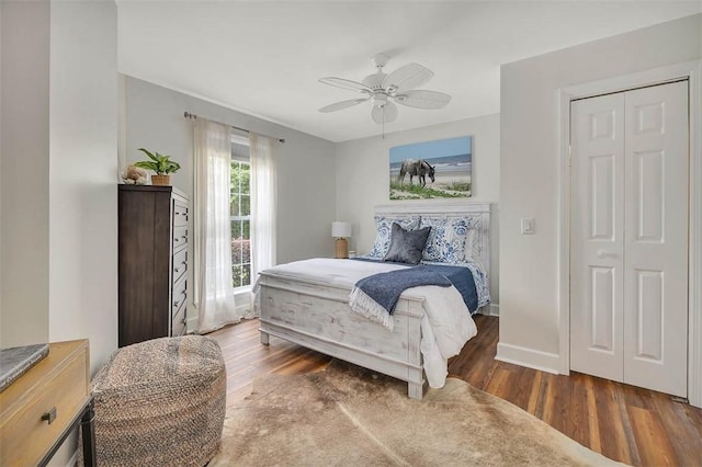 19 Wimbledon Ct, Saint Simons Island, GA 31522 - bedroom featuring wood finished floors, a ceiling fan, and a closet