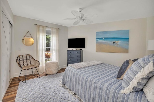 19 Wimbledon Ct, Saint Simons Island, GA 31522 - bedroom featuring wood finished floors, a closet, and a ceiling fan