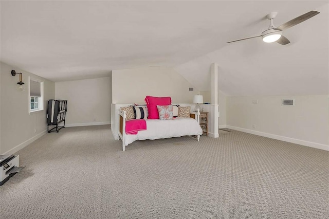 19 Wimbledon Ct, Saint Simons Island, GA 31522 - carpeted bedroom with vaulted ceiling and a ceiling fan
