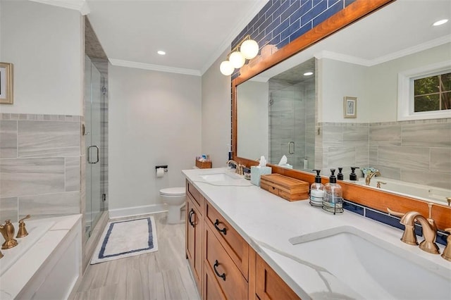 19 Wimbledon Ct, Saint Simons Island, GA 31522 - bathroom with double vanity, a stall shower, a garden tub, crown molding, and recessed lighting