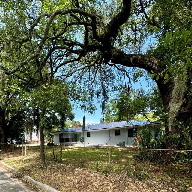 exterior space with central air condition unit