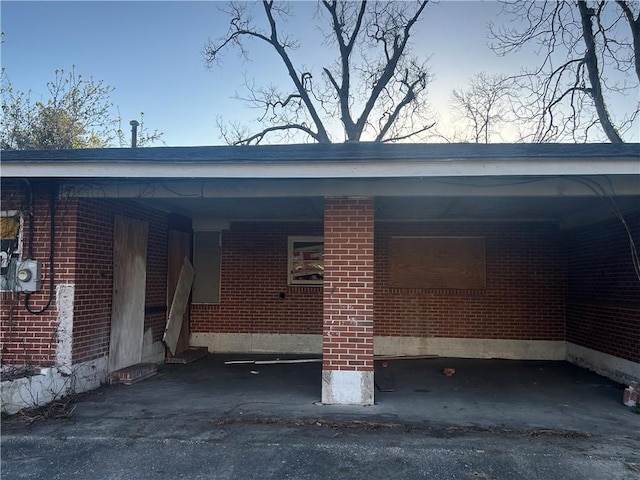 view of parking / parking lot featuring a carport