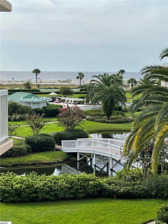 view of home's community with a water view