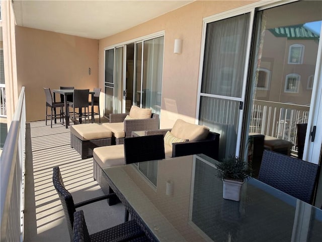 view of patio with a balcony