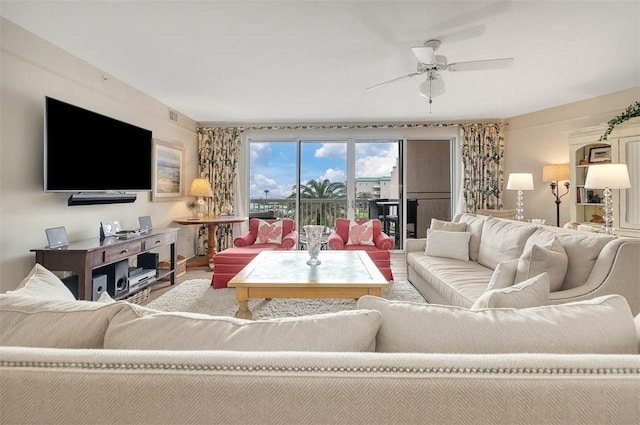 living room featuring ceiling fan