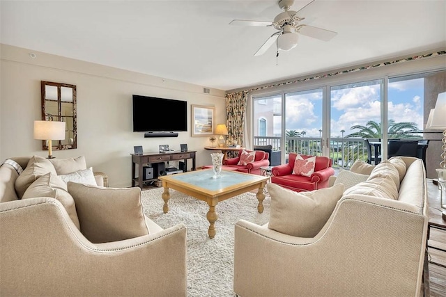 living room with ceiling fan