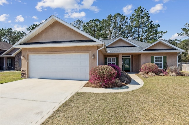 single story home with a garage, driveway, a front lawn, and stucco siding