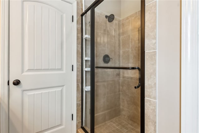 full bathroom featuring a stall shower