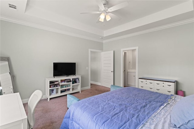 1616 Ashantilly Dr, Darien, GA 31305 - bedroom with carpet flooring, a tray ceiling, crown molding, and a ceiling fan