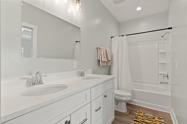 1616 Ashantilly Dr, Darien, GA 31305 - full bathroom featuring wood finished floors, shower / bath combo, and double vanity