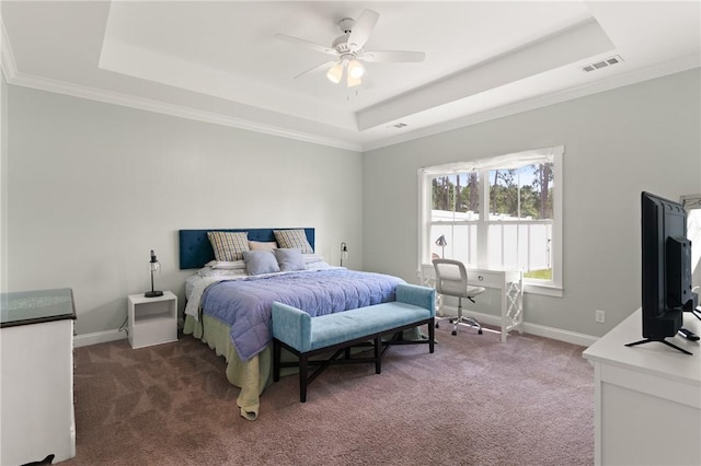 1616 Ashantilly Dr, Darien, GA 31305 - bedroom featuring a tray ceiling, carpet, crown molding, and a ceiling fan