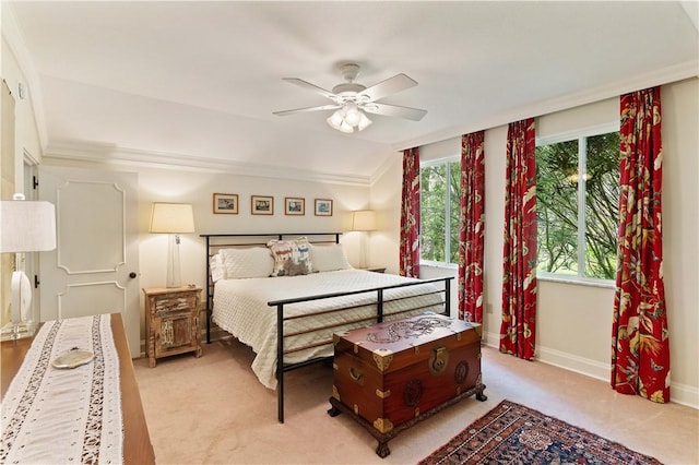 bedroom featuring lofted ceiling, ceiling fan, and baseboards