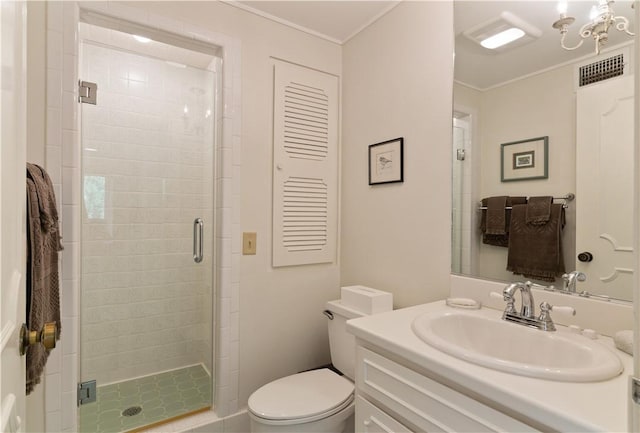 bathroom featuring toilet, visible vents, vanity, ornamental molding, and a stall shower