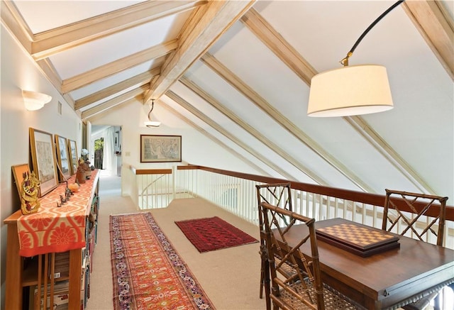 interior space featuring vaulted ceiling with beams and carpet floors