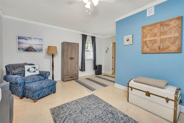 103 Travellers Way, Saint Simons Island, GA 31522 - sitting room featuring ornamental molding, ceiling fan, a textured ceiling, and speckled floor