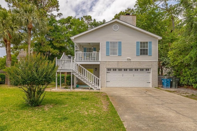 103 Travellers Way, Saint Simons Island, GA 31522 - view of front of house featuring covered porch, a garage, stairs, driveway, and a front lawn