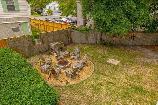 103 Travellers Way, Saint Simons Island, GA 31522 - fenced backyard with an outdoor fire pit